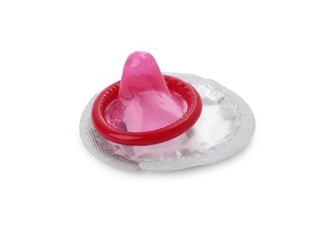 Unpacked condom on white background. Safe sex