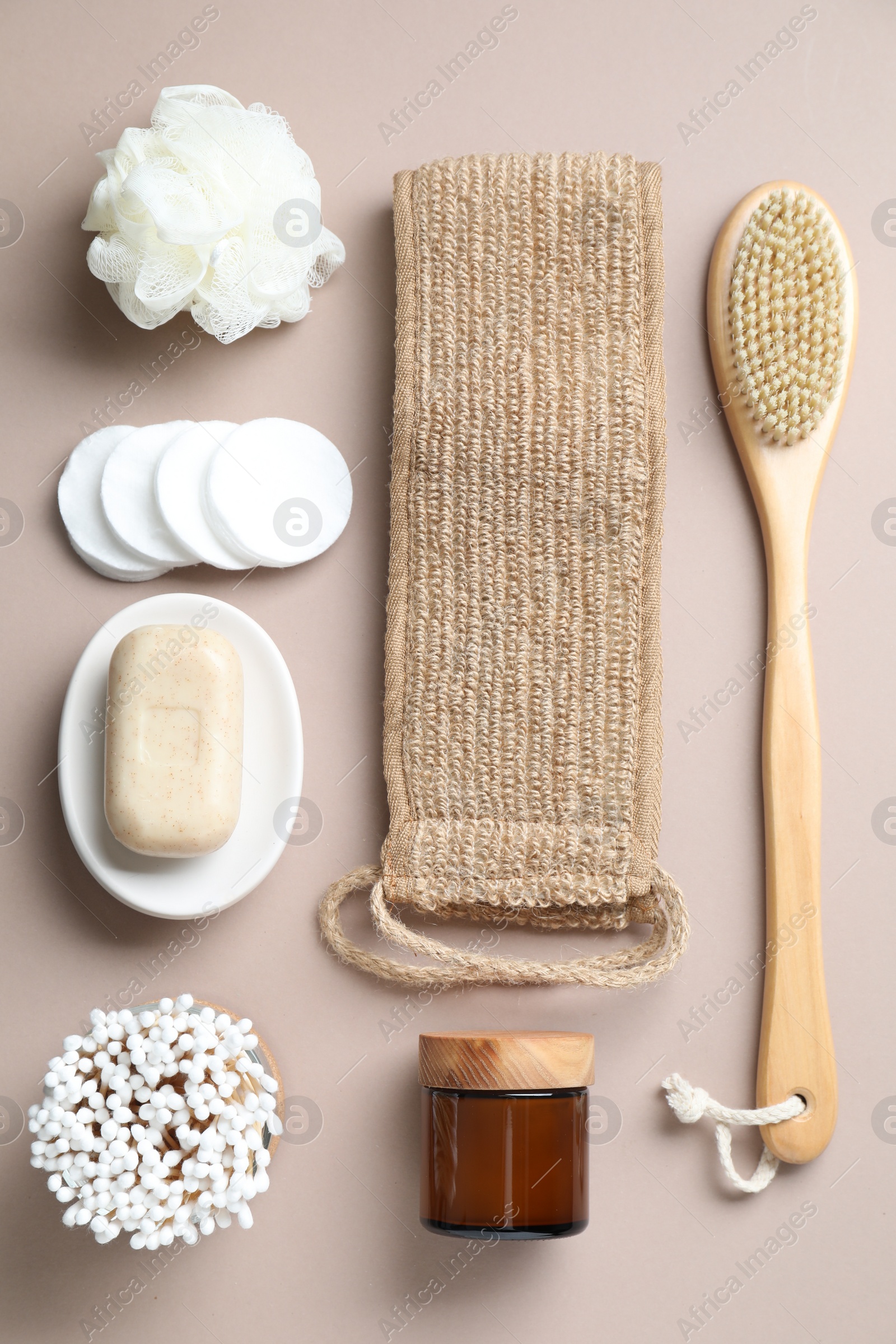 Photo of Bath accessories. Flat lay composition with personal care products on beige background