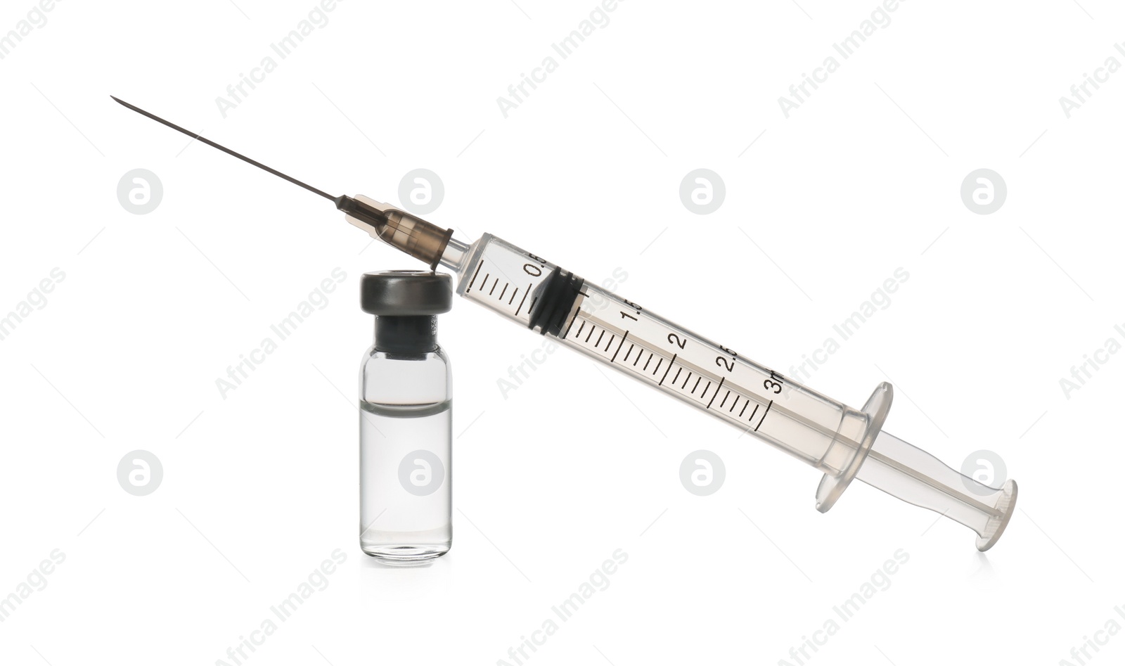 Photo of Syringe with vial of medicine isolated on white