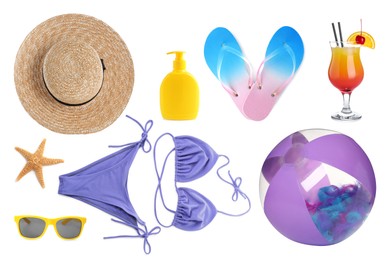 Set with beach ball and other accessories on white background