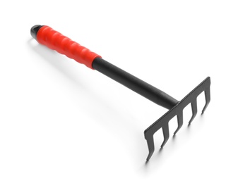 Photo of New rake on white background. Professional gardening tool