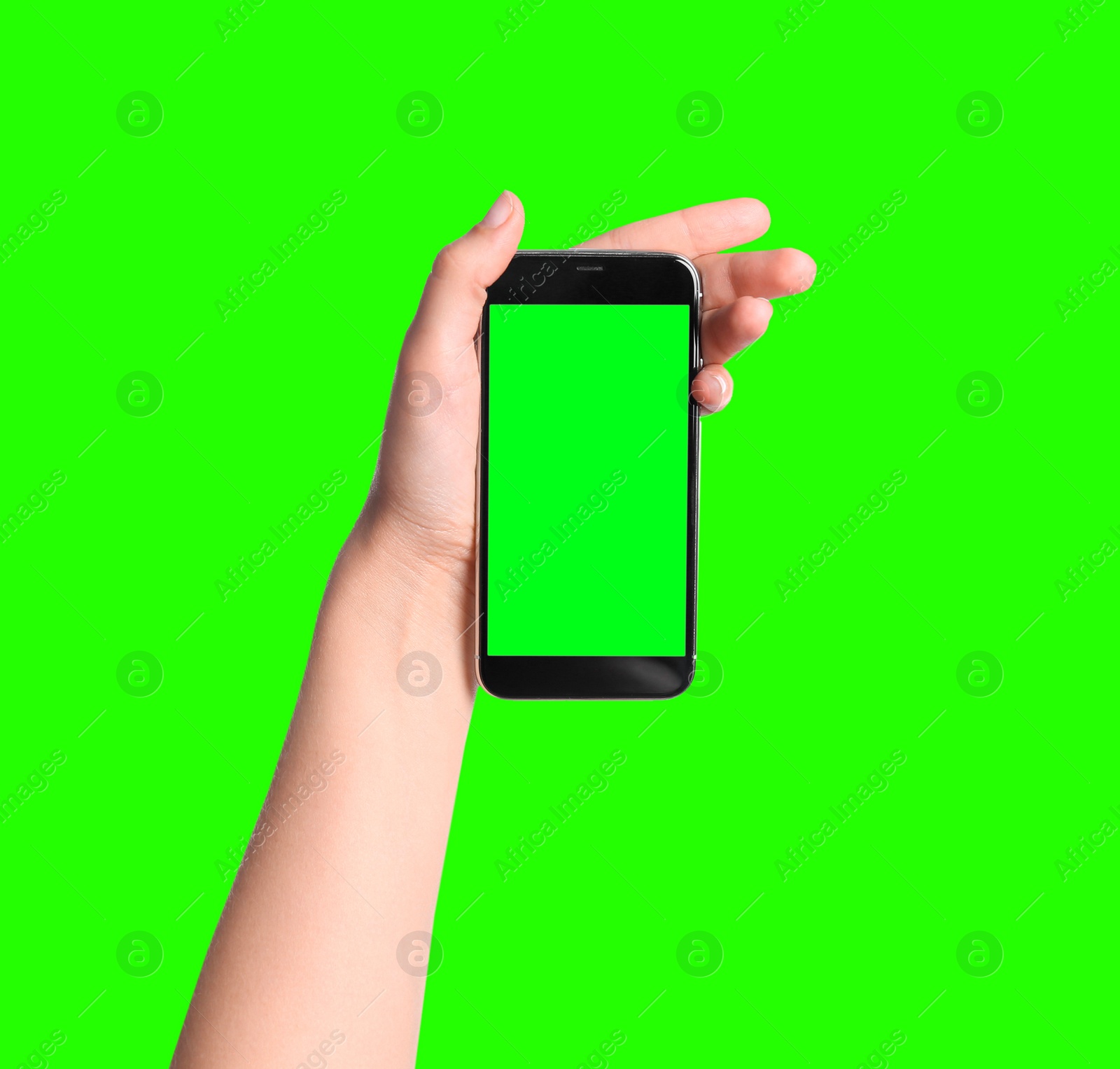 Image of Young woman holding smartphone with green screen on color background, closeup. Mockup for design