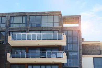 Photo of Exterior of beautiful residential building with balconies