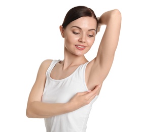 Young woman showing smooth silky skin after epilation on white background