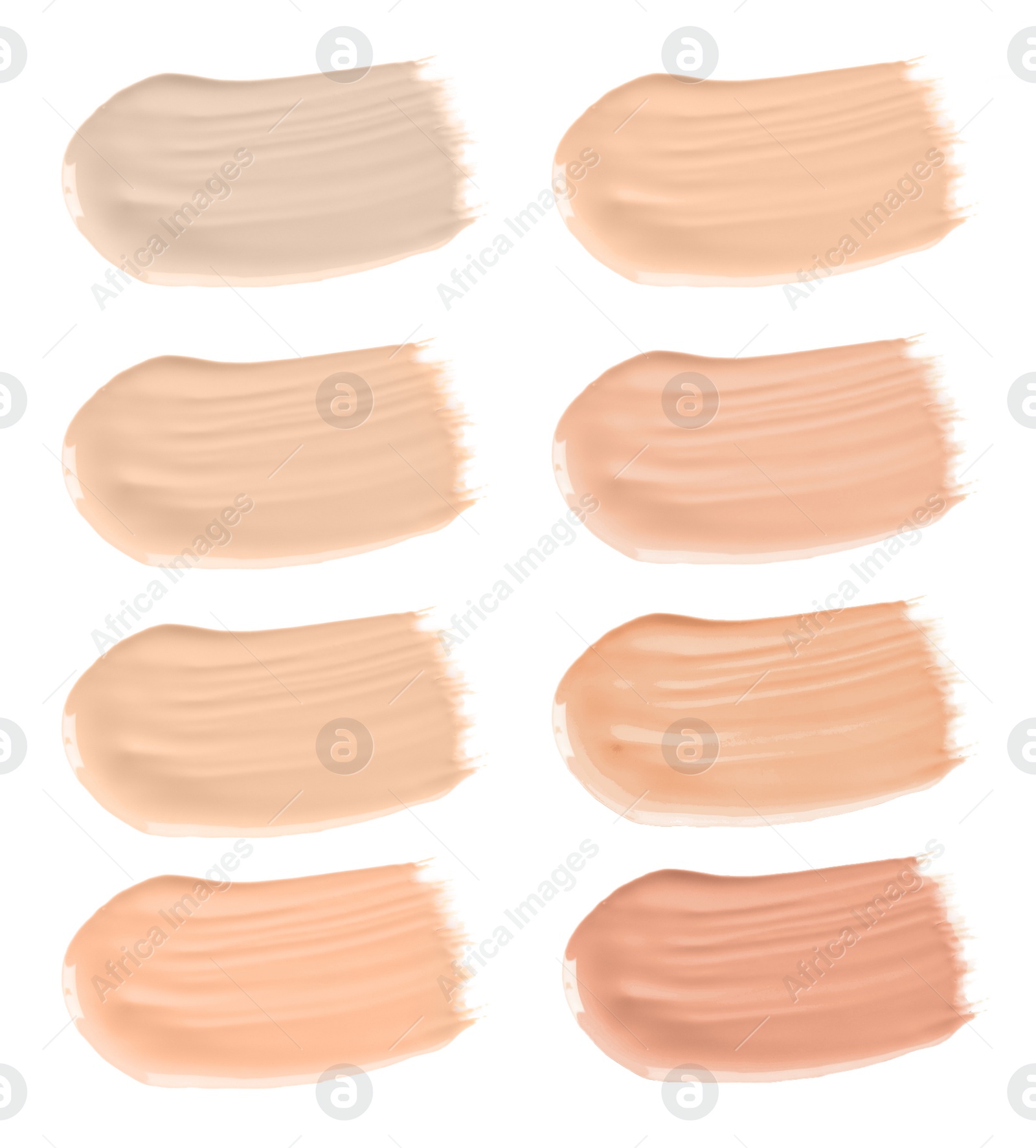 Image of Set of different foundation shades on white background, top view