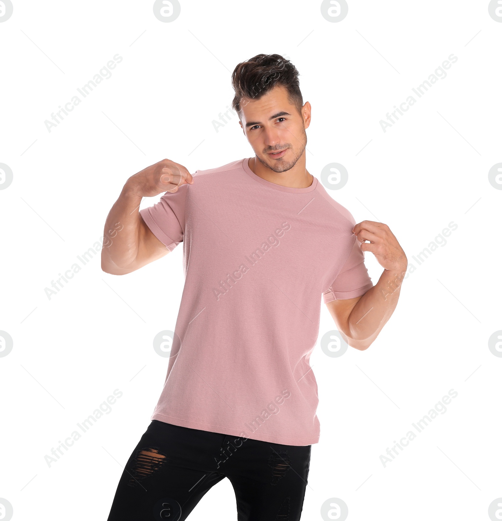 Photo of Young man in t-shirt on white background. Mockup for design