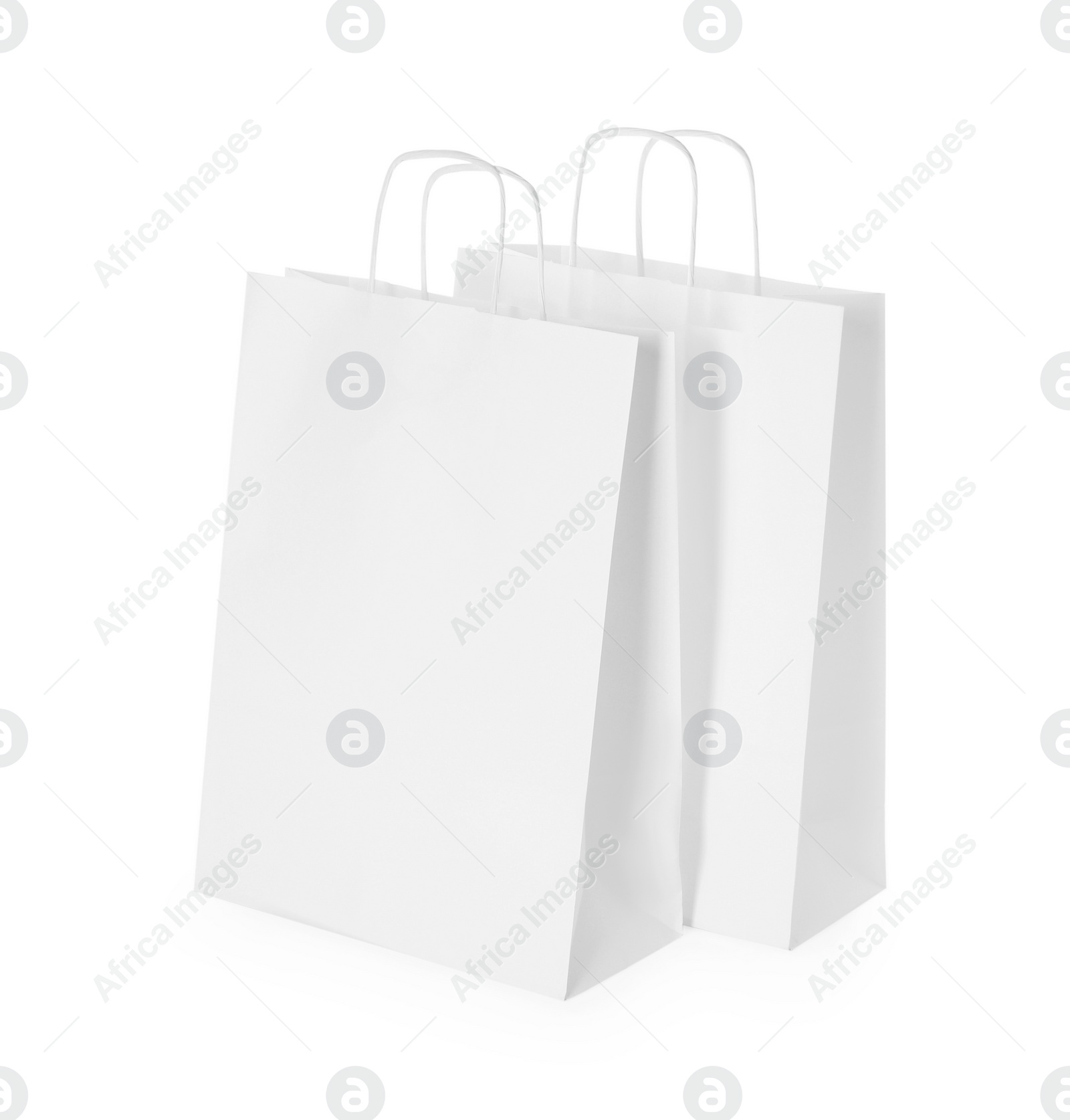 Photo of Two paper shopping bags isolated on white