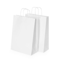 Photo of Two paper shopping bags isolated on white