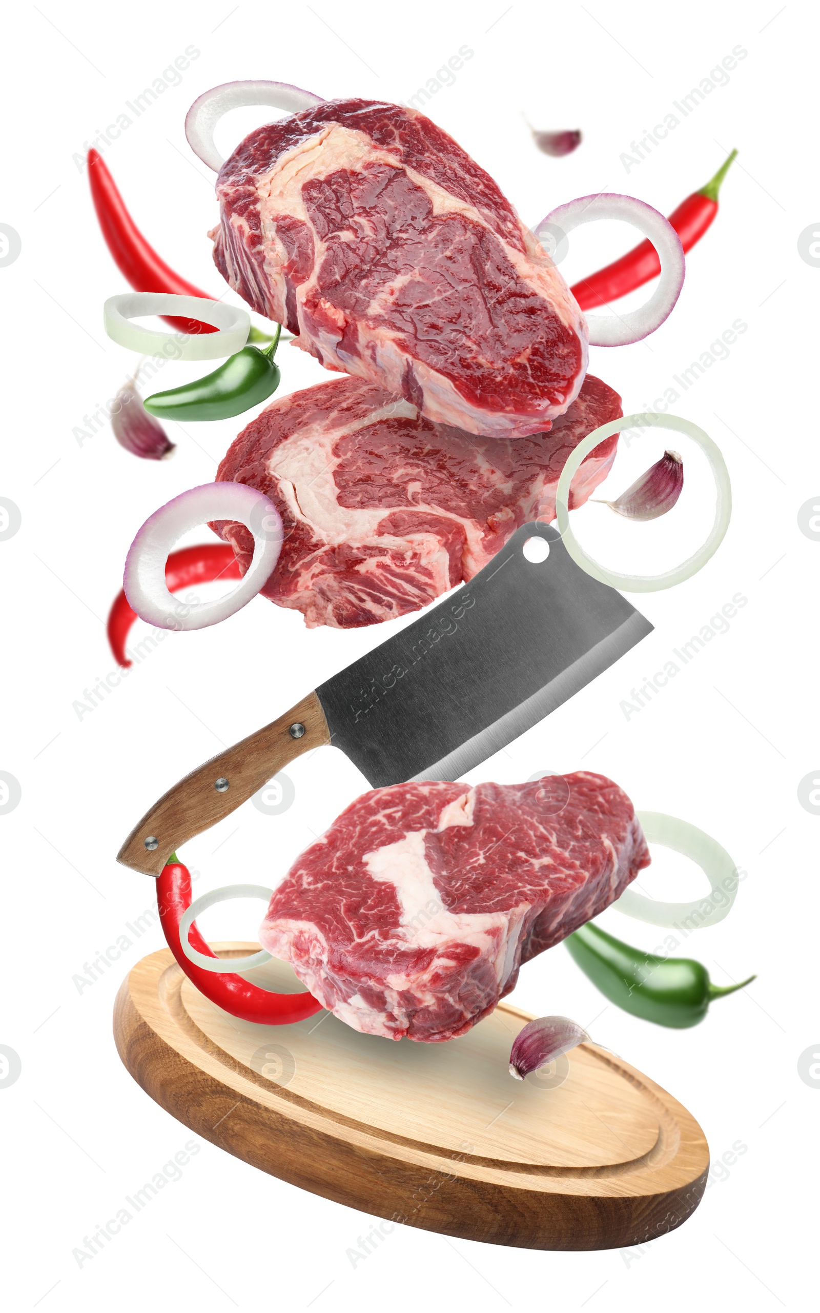 Image of Beef meat, different spices, cleaver knife and board falling on white background