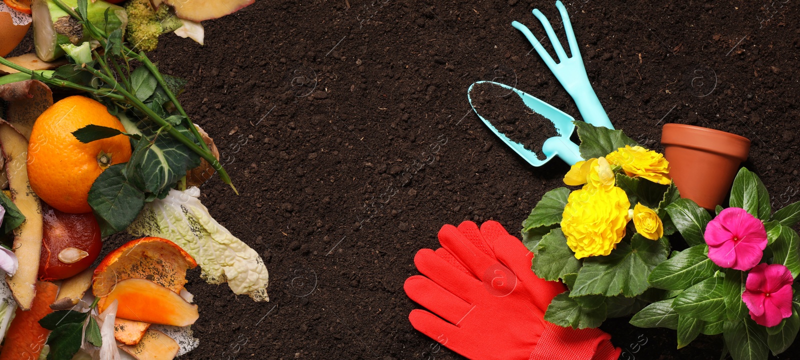 Image of Gardening tools, flowers and organic waste for composting on soil, flat lay. Natural fertilizer