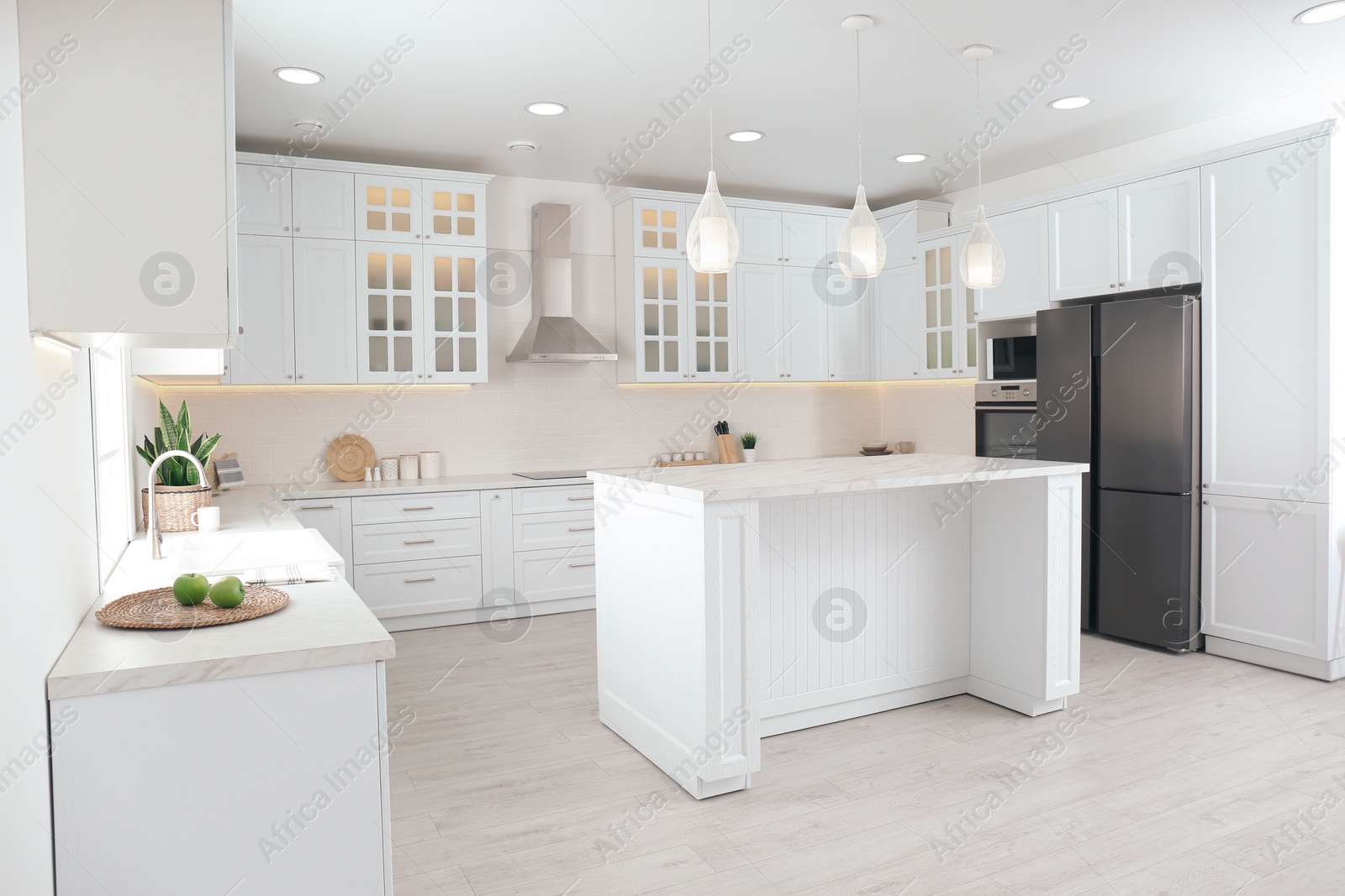 Photo of Beautiful kitchen interior with new stylish furniture