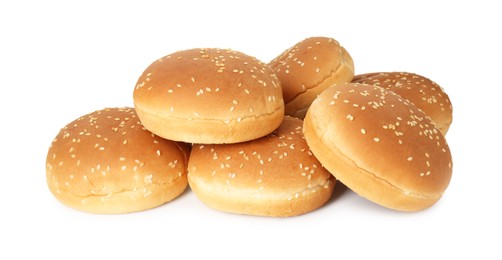 Photo of Many fresh burger buns isolated on white