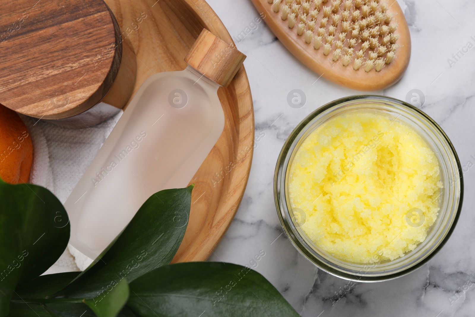 Photo of Flat lay composition with natural body scrub on white marble table. Anti cellulite treatment