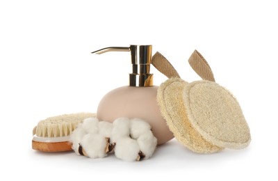 Photo of Set of toiletries with natural loofah sponges on white background
