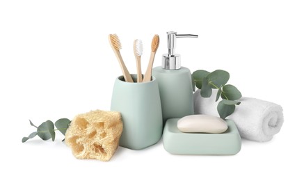 Photo of Bath accessories. Different personal care products and eucalyptus branches isolated on white