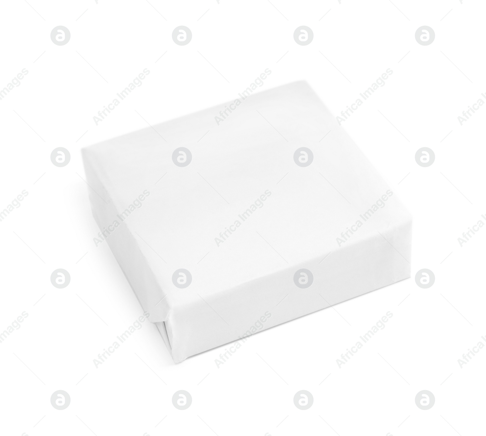 Photo of Hand made soap bar in paper package on white background. Mockup for design