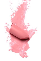 Photo of Pink lipstick and smear on white background, top view