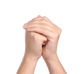 Photo of Woman holding hands clasped while praying on white background, closeup