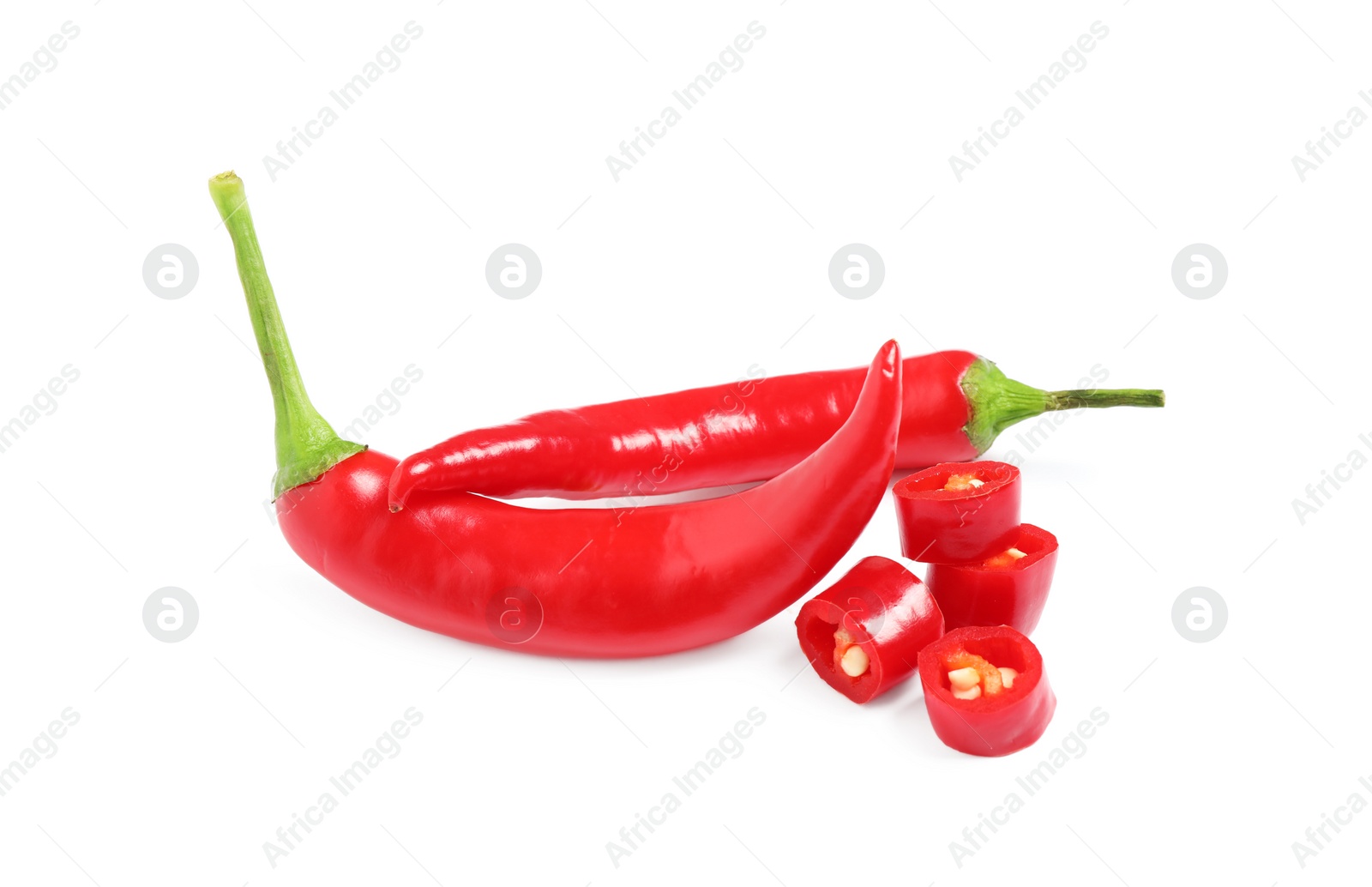 Photo of Ripe red hot chili peppers isolated on white