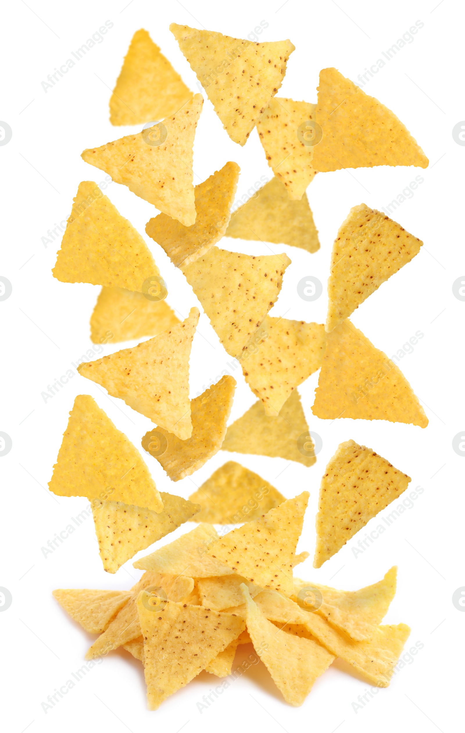 Image of Tasty tortilla chips (nachos) falling into pile on white background