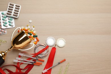 Photo of Flat lay composition with drugs on wooden table, space for text. Doping control