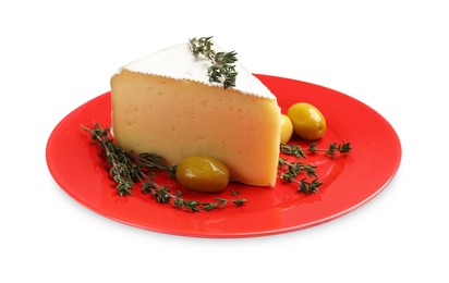 Photo of Plate with piece of tasty camembert cheese, olives and thyme isolated on white