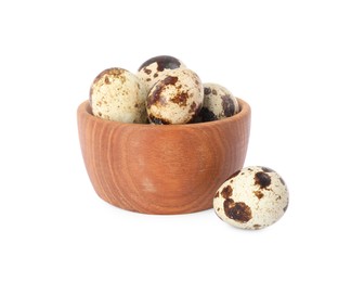 Photo of Wooden bowl with quail eggs isolated on white