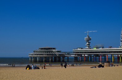 Photo of Hague, Netherlands - May 2, 2022: Beautiful view of beach and Scheveningen Pier