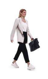 Photo of Beautiful happy businesswoman with briefcase walking on white background