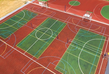 Image of Outdoor sports complex on sunny day, aerial view