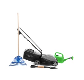 Photo of Modern electric grass cutter and gardening tools on white background