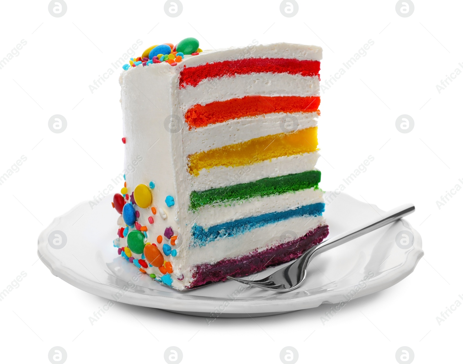 Photo of Plate with slice of delicious rainbow cake on white background