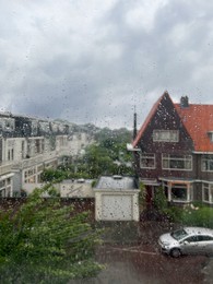 Window glass with water drops, view from inside. Rainy weather