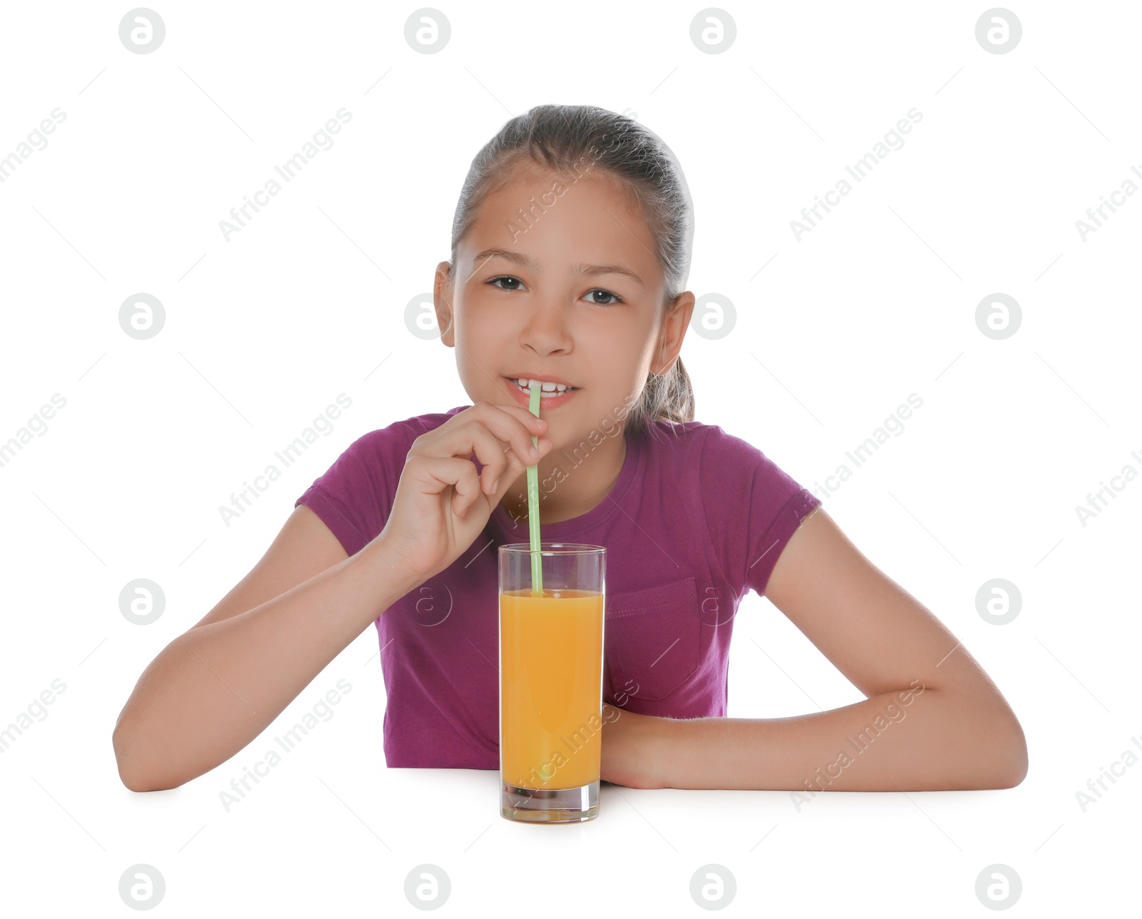 Photo of Cute happy girl with glass of juice and straw isolated on white