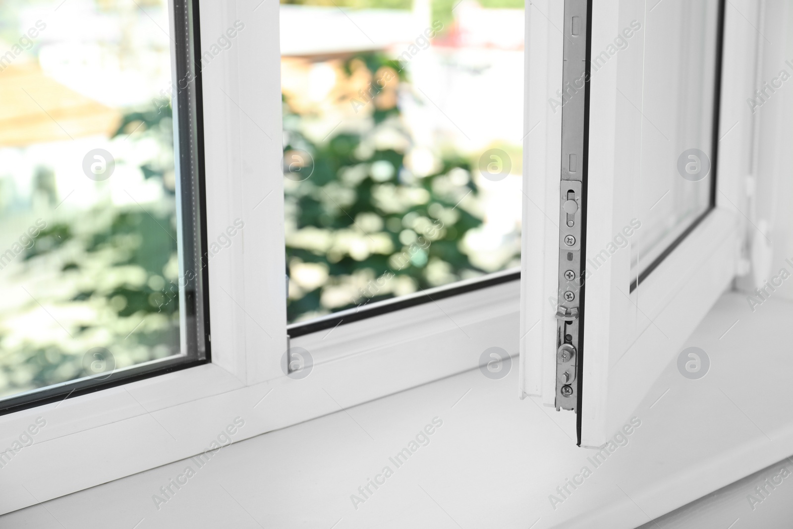 Photo of Modern window indoors, closeup view. Home interior