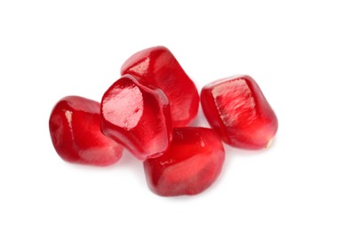 Photo of Tasty juicy pomegranate seeds on white background