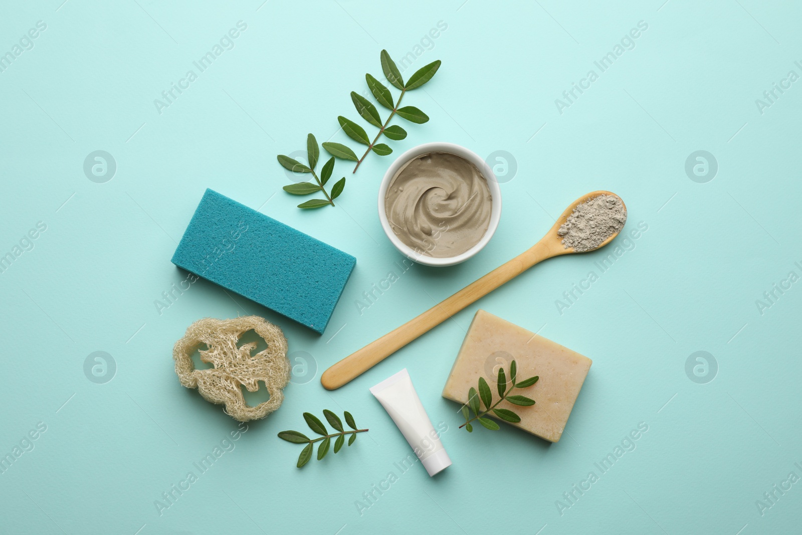 Photo of Flat lay composition with pumice stone on turquoise background