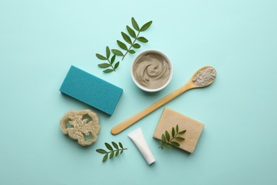 Photo of Flat lay composition with pumice stone on turquoise background