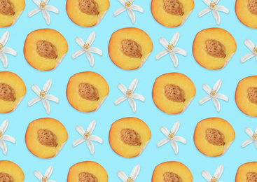 Image of Pattern of citrus flowers and peach halves on light blue background
