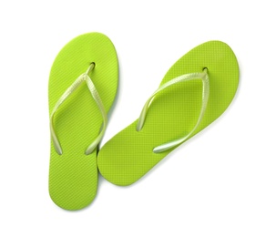 Photo of Bright flip flops on white background, top view. Beach accessories