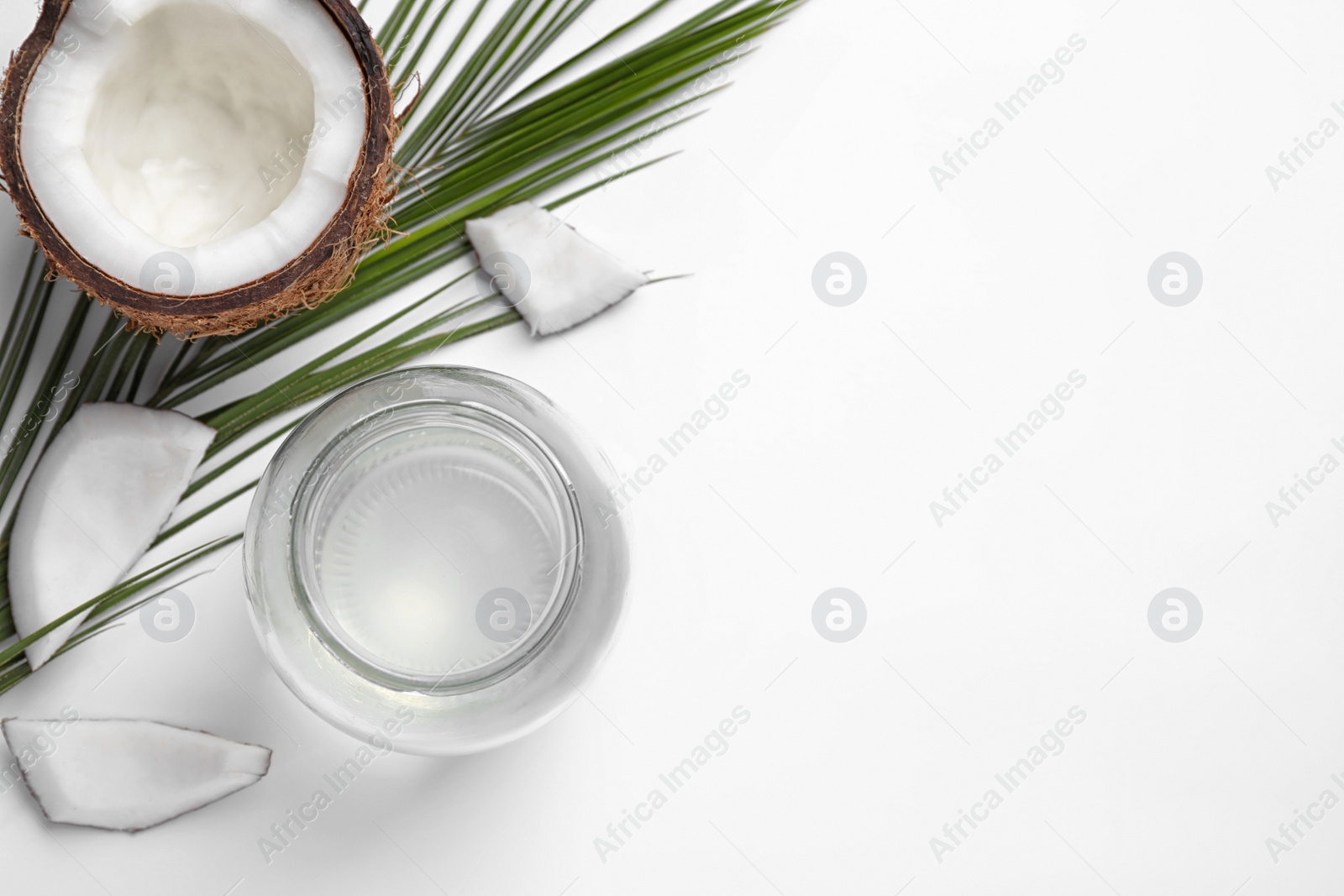 Photo of Composition with coconut oil on white background, top view