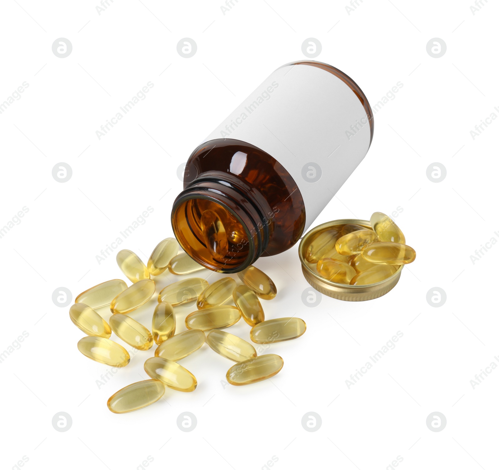 Photo of Scattered softgel capsules and bottle isolated on white