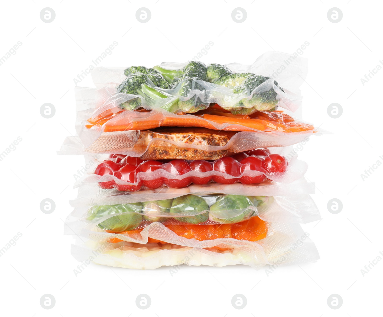 Photo of Stack of vacuum packs with different food products on white background