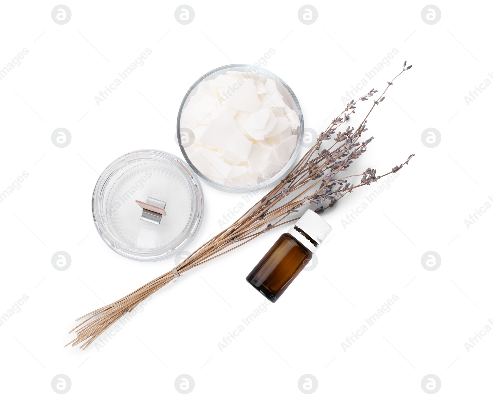 Photo of Wax flakes, dry lavender and essential oil on white background, top view. Making homemade candle