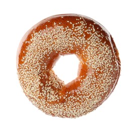 Photo of Delicious fresh bagel with sesame seeds isolated on white