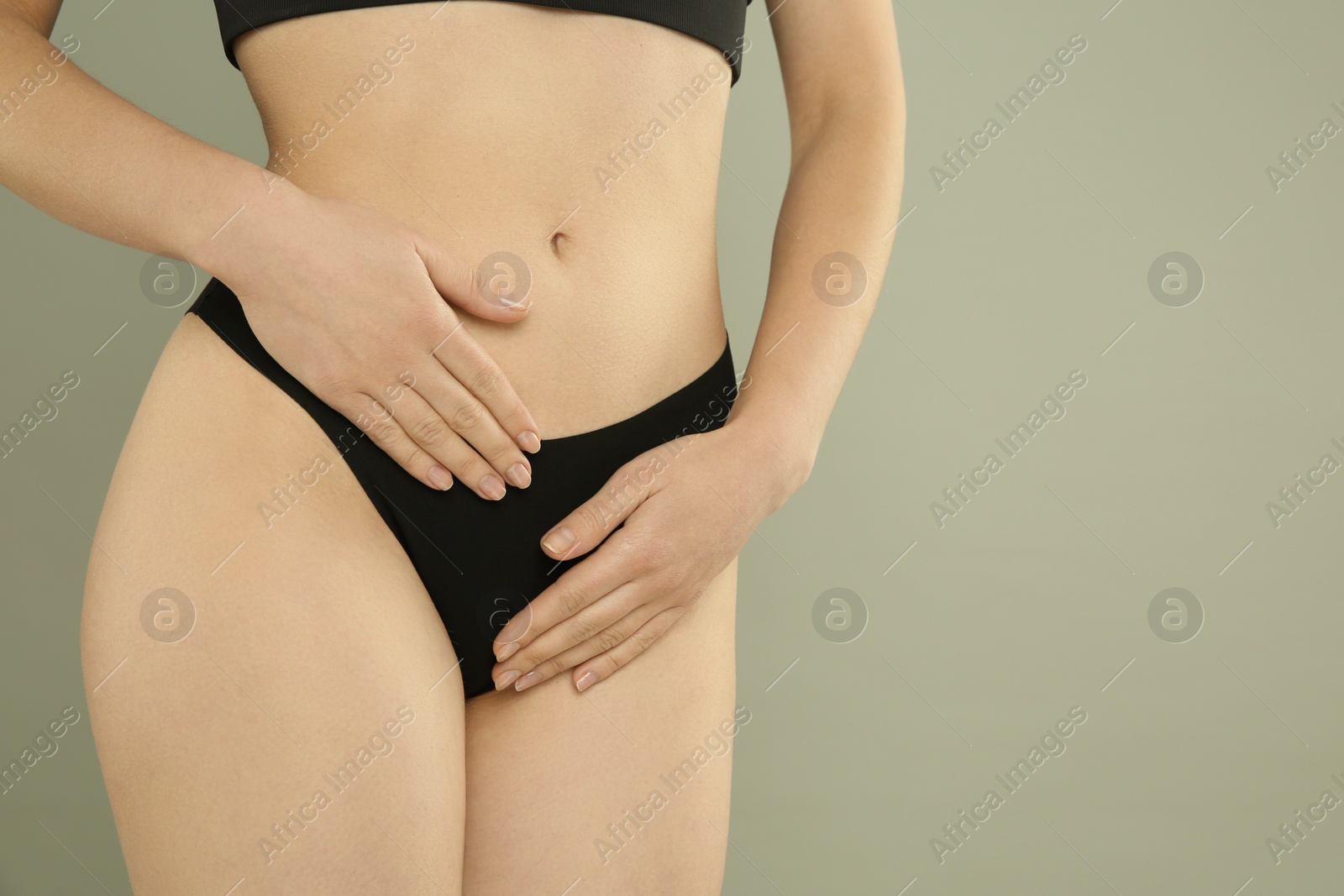 Photo of Gynecology. Woman in underwear on grey background, closeup. Space for text