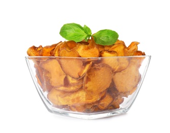 Photo of Bowl of sweet potato chips with basil isolated on white