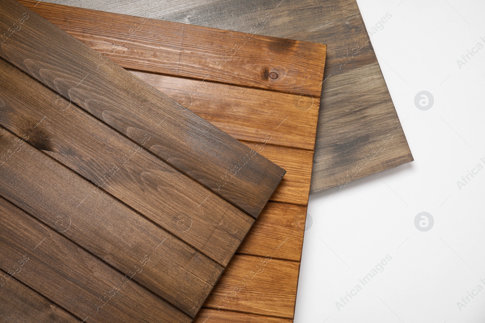 Photo of Different wooden surfaces for photography on white background, top view