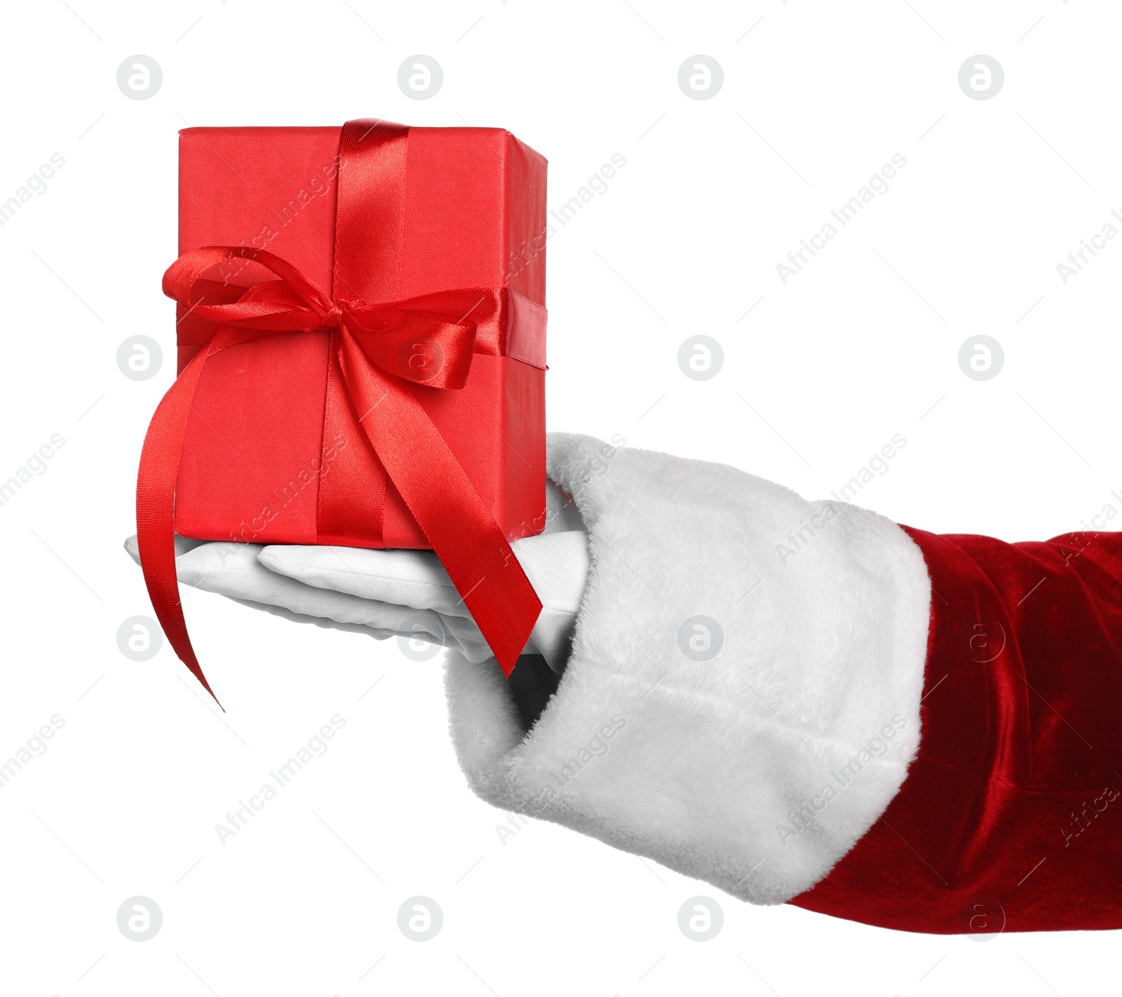 Photo of Merry Christmas. Santa Claus holding gift box on white background, closeup