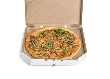 Photo of Cardboard box with tasty pizza on white background